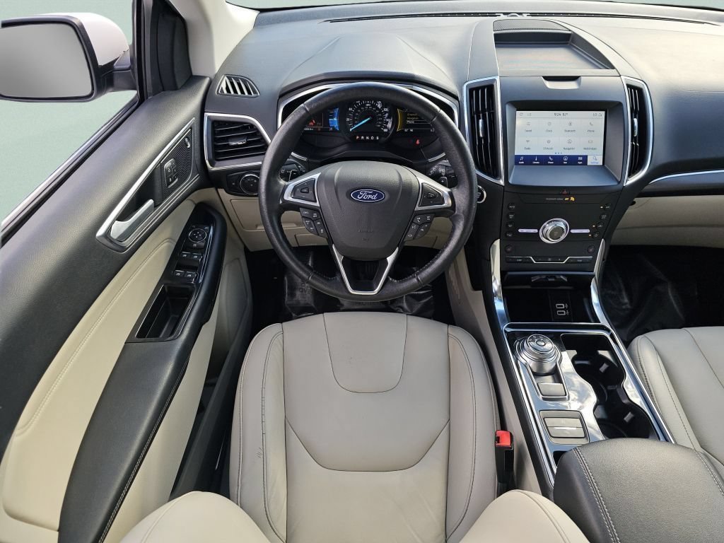 Used 2020 White Metallic Ford Titanium image 4