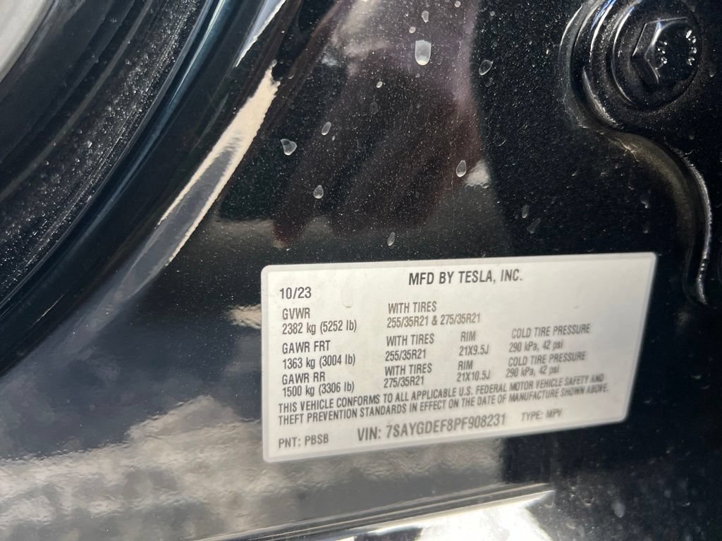 Used 2023 Solid Black Tesla Performance image 17