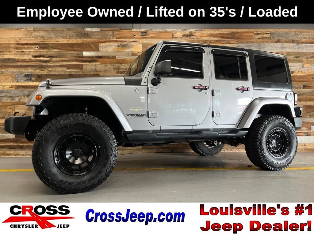 Used 2014 Billet Metallic Clearcoat Jeep Unlimited Sahara image 1