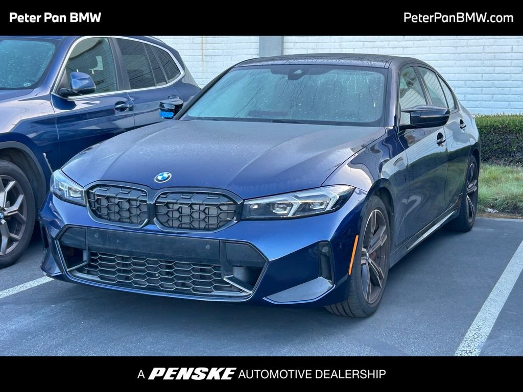 Certified Used 2023 Tanzanite Blue II Metallic BMW M340i image 1
