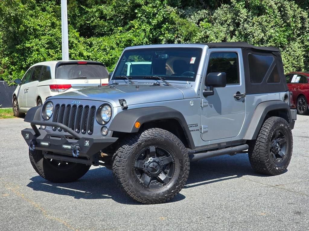 Used 2015 Silver Jeep Sport image 2