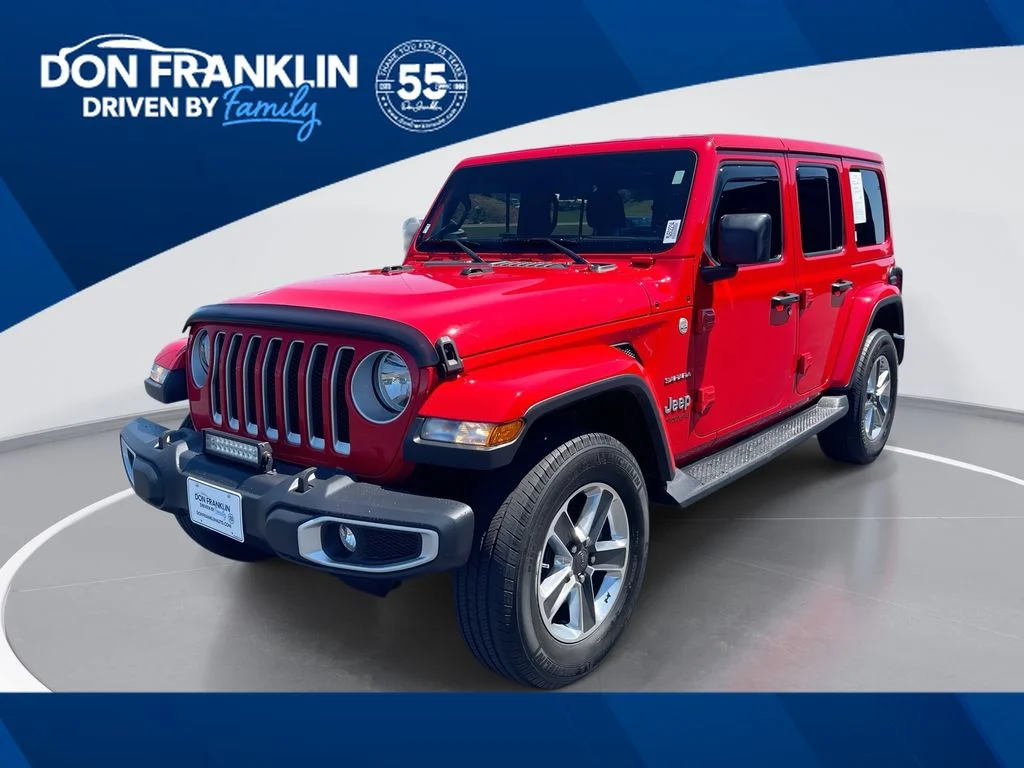 Used 2021 Red Jeep Unlimited Sahara image 1