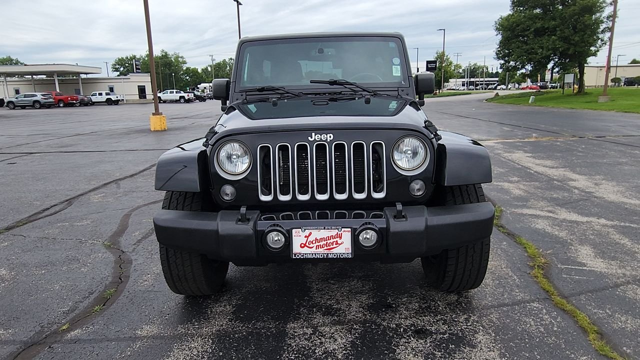 Used 2018 Black Clearcoat Jeep Sahara image 3