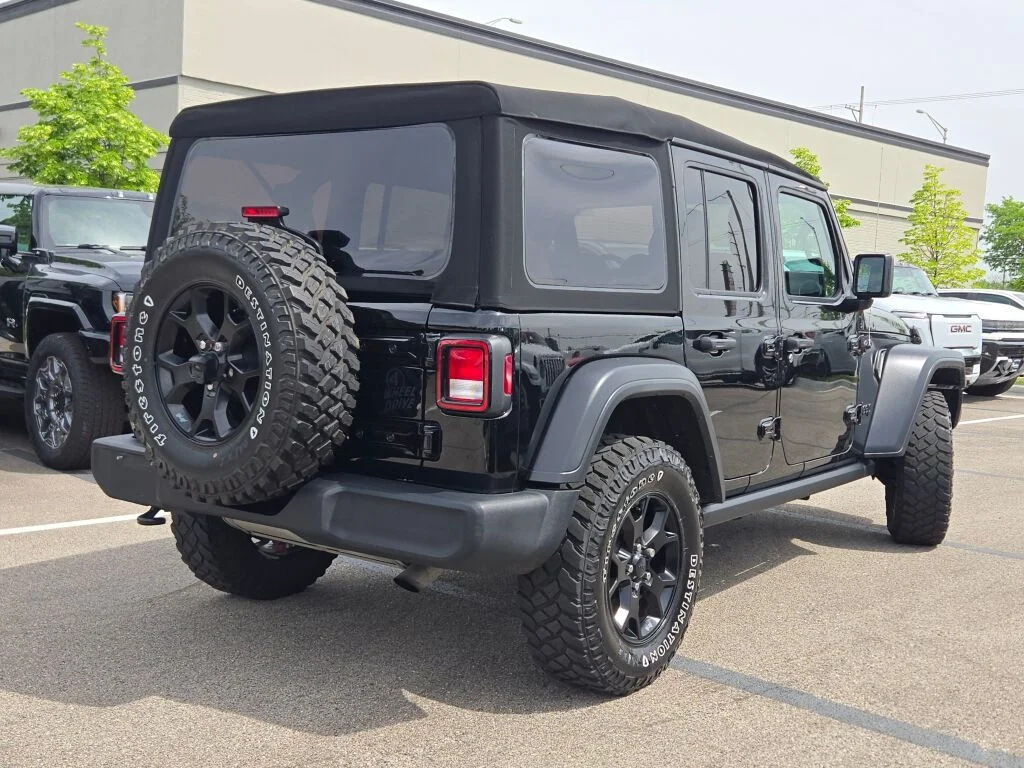 Used 2020 Black Jeep Unlimited Sport image 14
