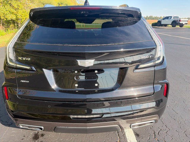 Used 2024 Stellar Black Metallic Cadillac Sport image 13
