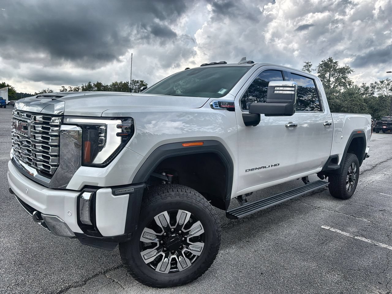 Used 2024 White Frost Tricoat GMC Denali image 1