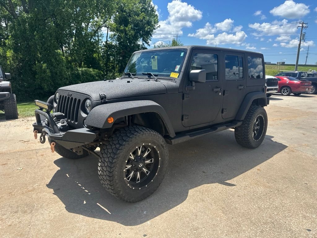 Used 2014 Jeep Wrangler Unlimited Sport with VIN 1C4BJWDG8EL245084 for sale in Kansas City
