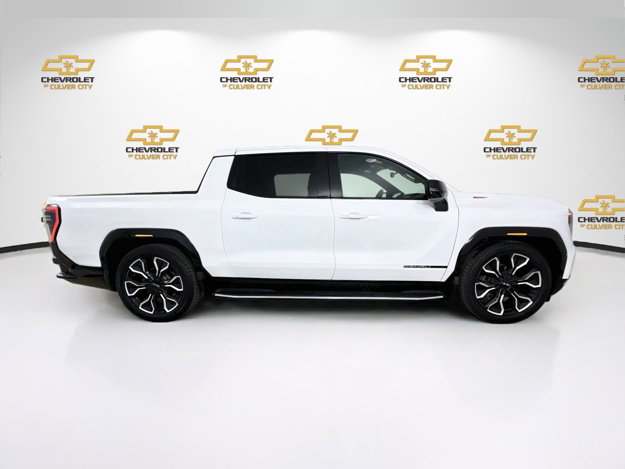 Used 2025 Summit White GMC Max Range Denali image 9