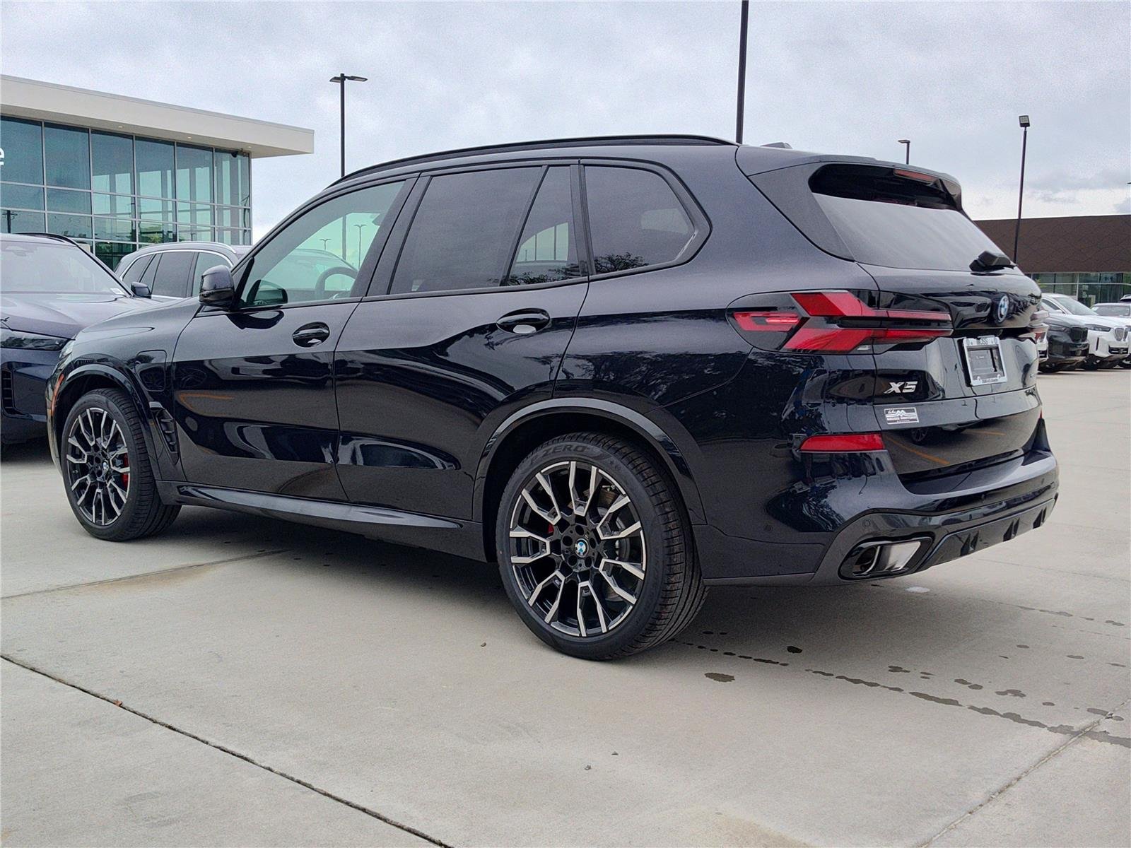 New 2026 Carbon Black Metallic BMW xDrive50e image 3