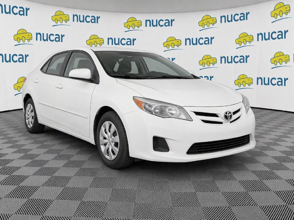 Used 2011 White Toyota LE image 2