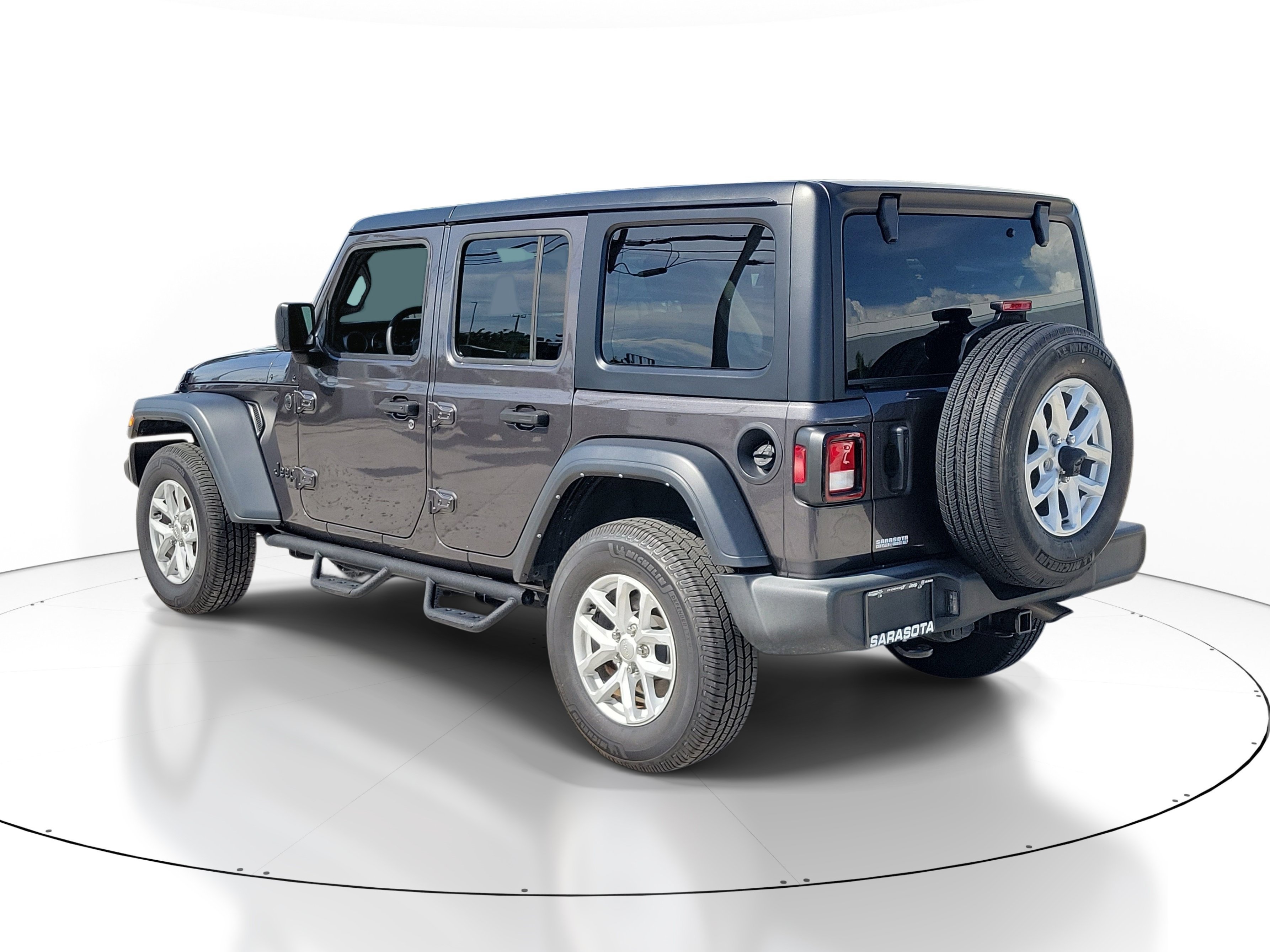 Used 2023 Granite Crystal Metallic Clearcoat Jeep Sport S image 4