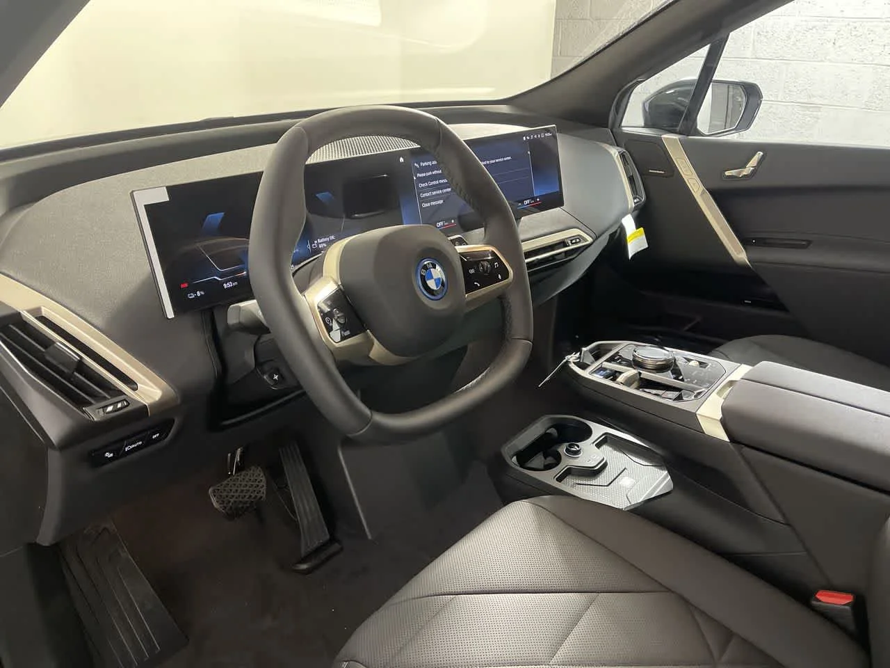 Used 2024 Black Sapphire Metallic BMW xDrive50 image 12