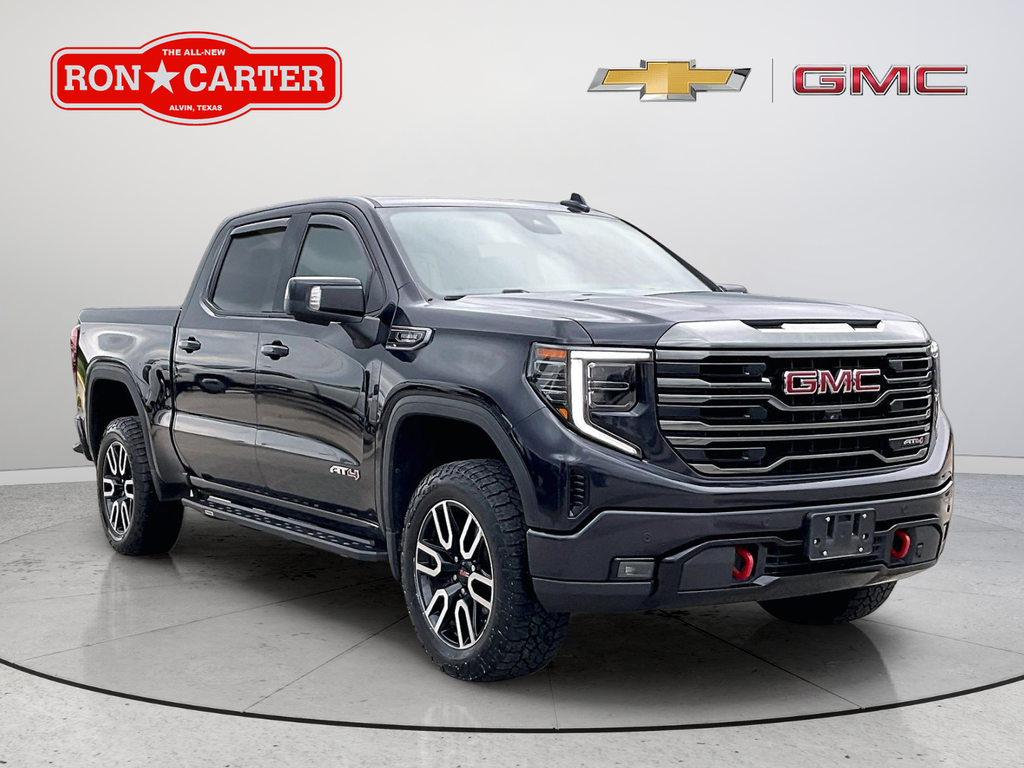 Used 2023 Titanium GMC AT4 image 1