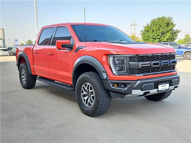 Used 2023 Orange Ford Raptor 4x4 SuperCrew Cab 5.5 ft. box 145 in. WB image 4