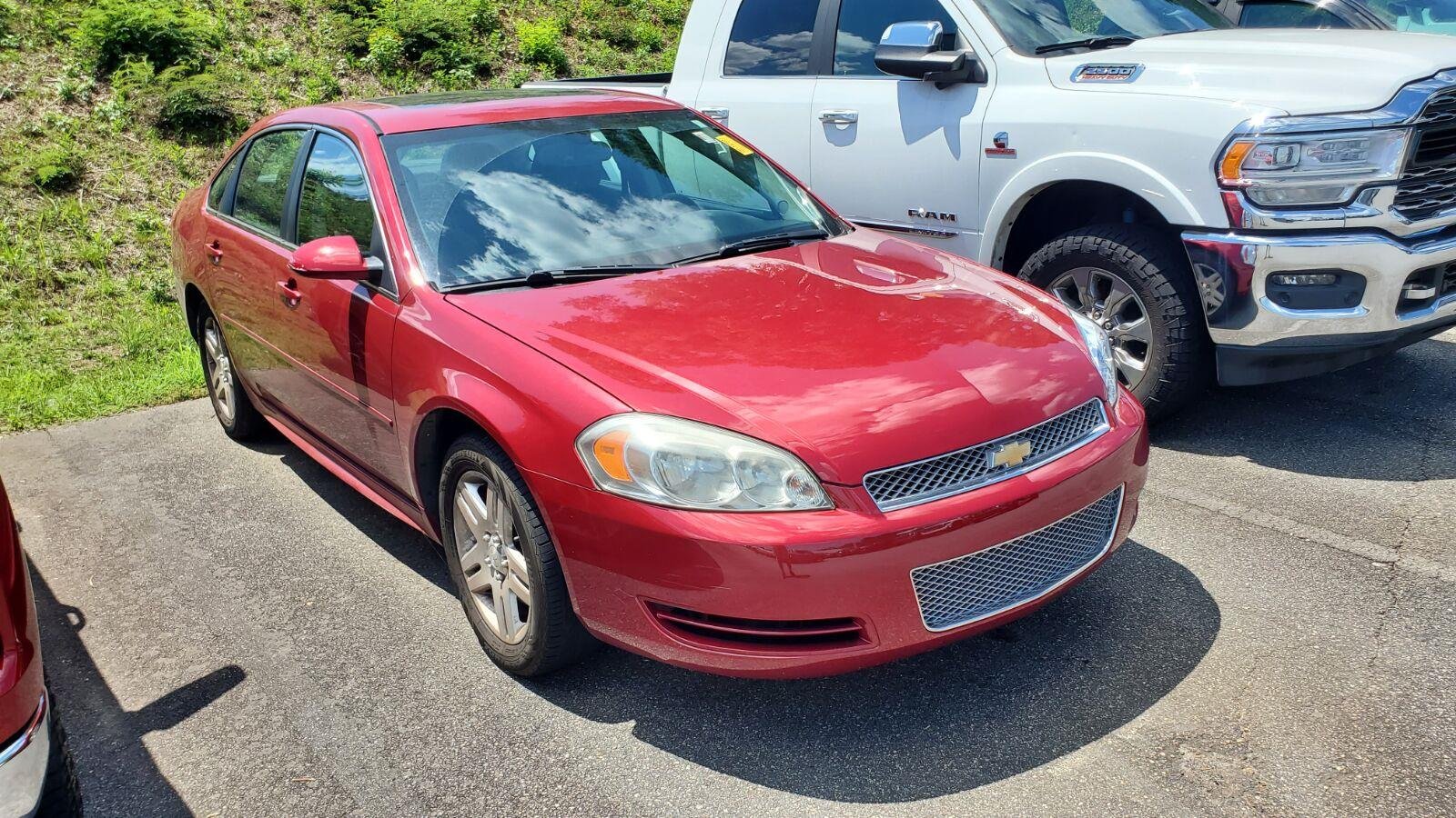 Used 2013 CRYSTAL RED TINTCOAT Chevrolet LT image 2