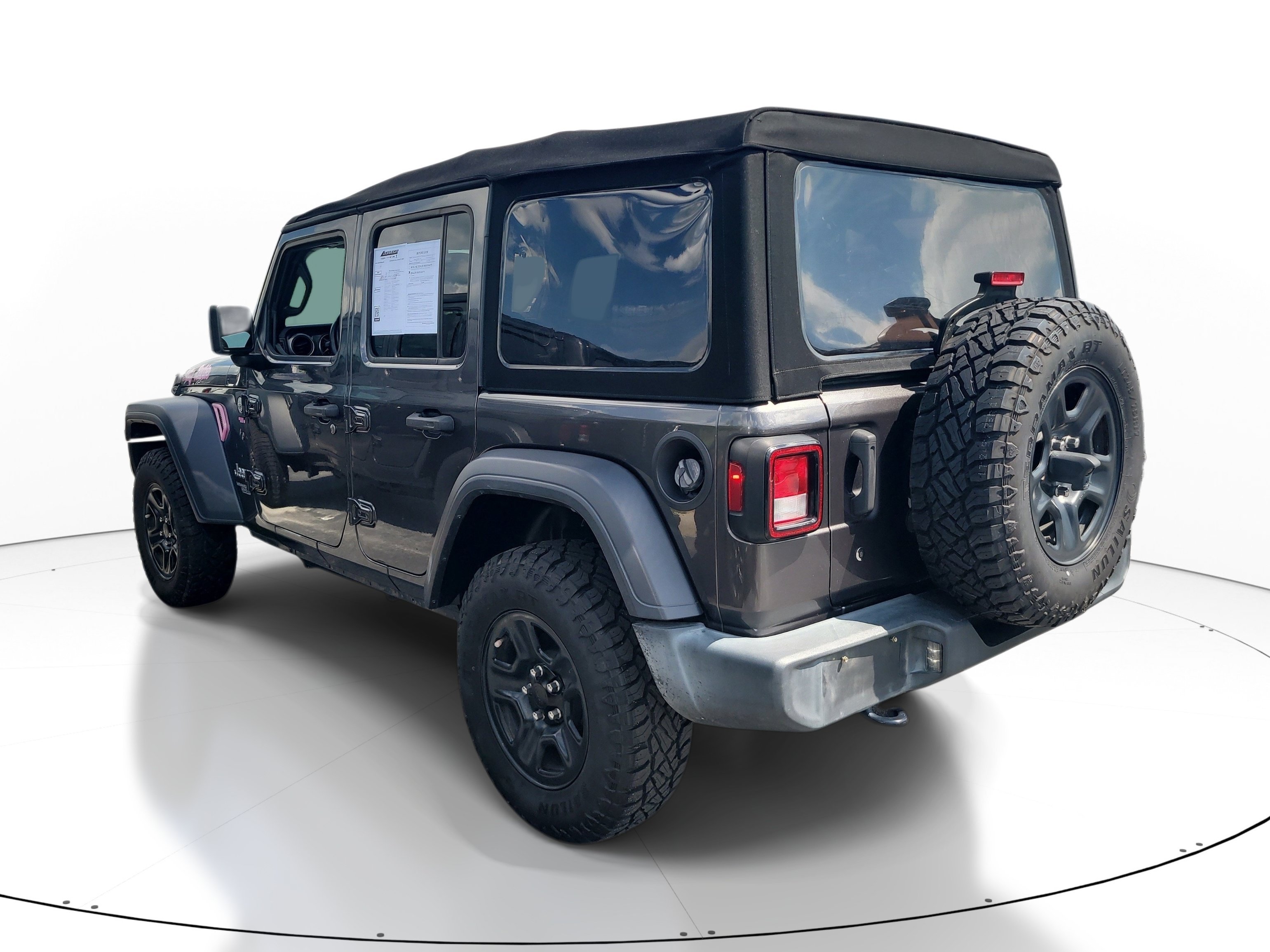 Used 2019 Granite Crystal Metallic Clearcoat Jeep Sport image 6