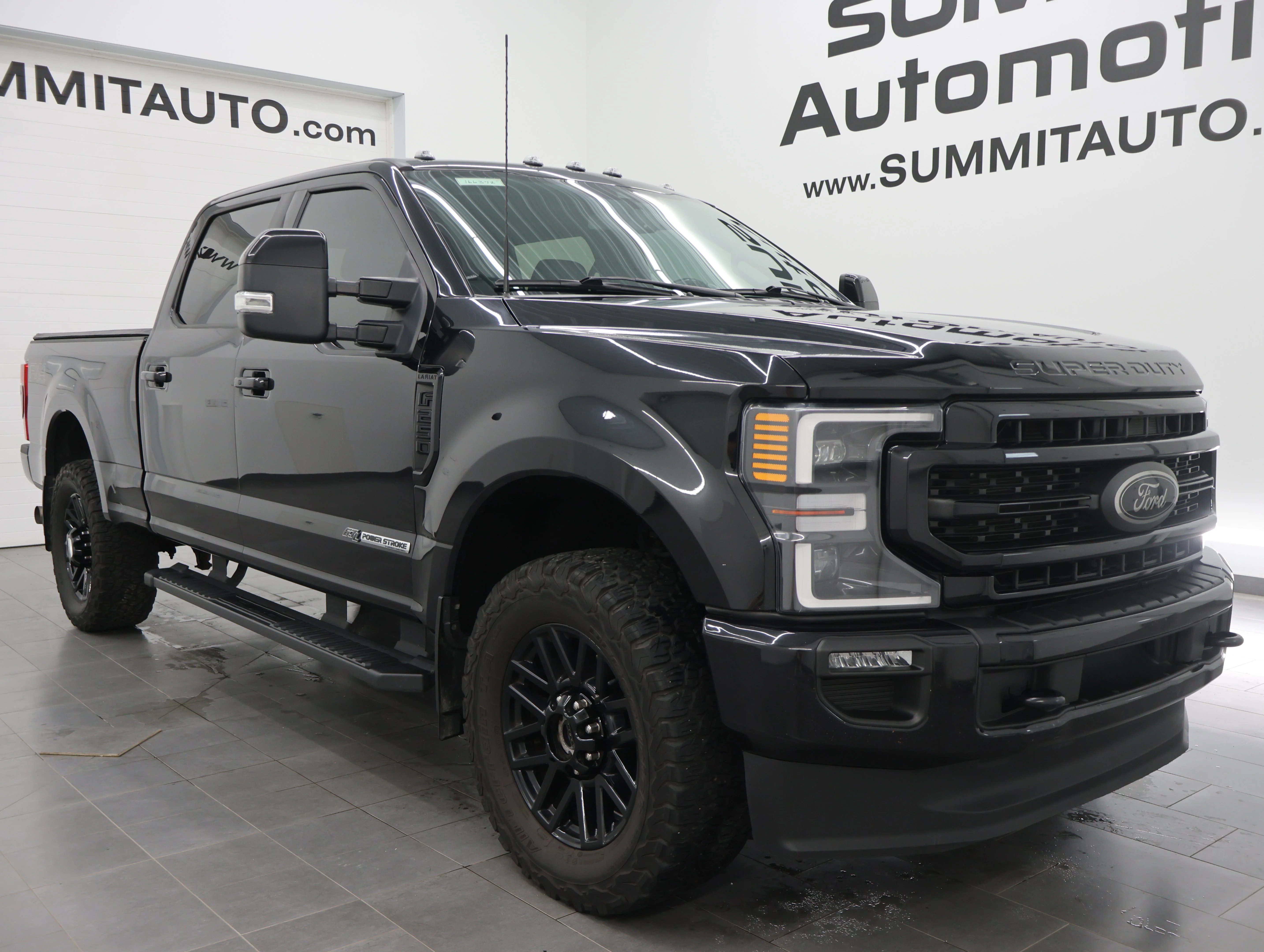Used 2022 Agate Black Metallic Ford Lariat image 2
