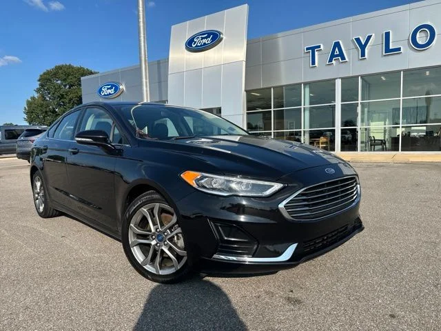 Used 2020 Agate Black Metallic Ford SEL image 4