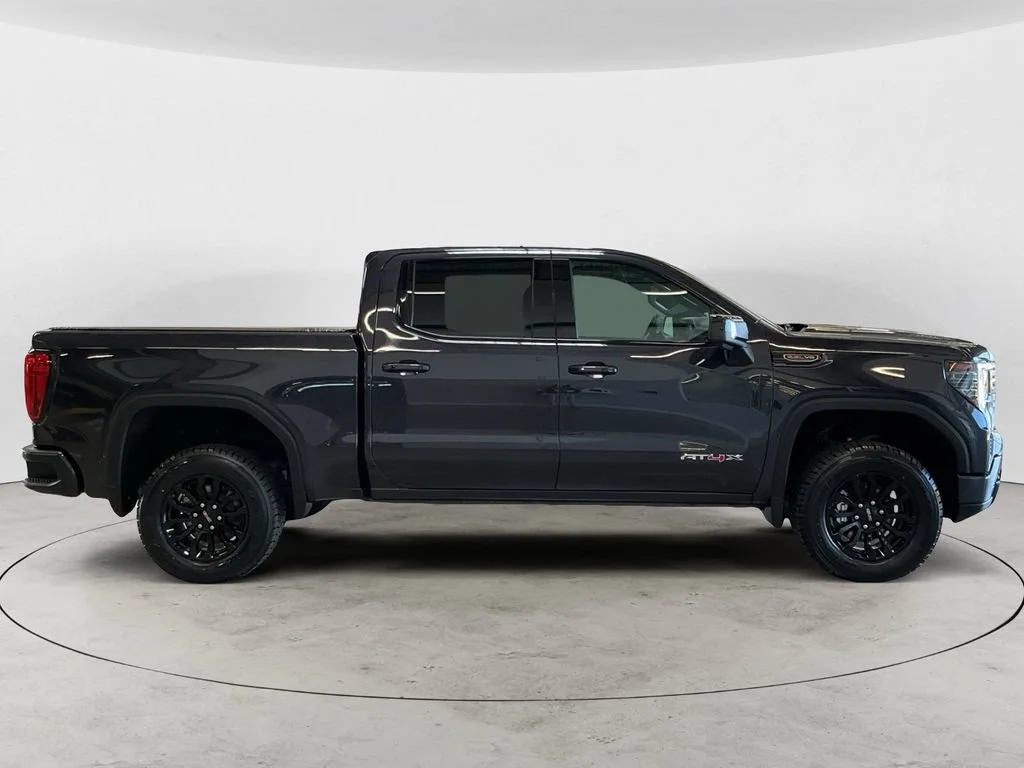 Used 2023 Titanium Rush Metallic GMC AT4X image 4