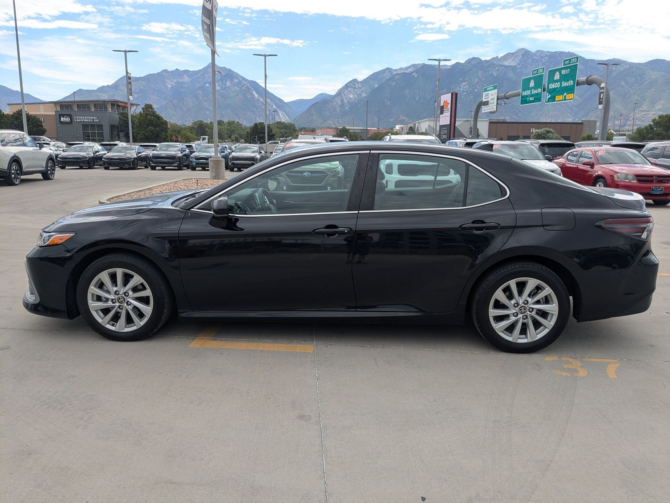 Used 2023 Midnight Black Metallic Toyota LE image 3