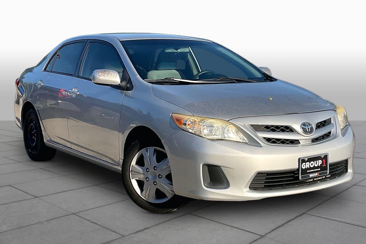 Used 2011 Classic Silver Metallic Toyota LE image 2