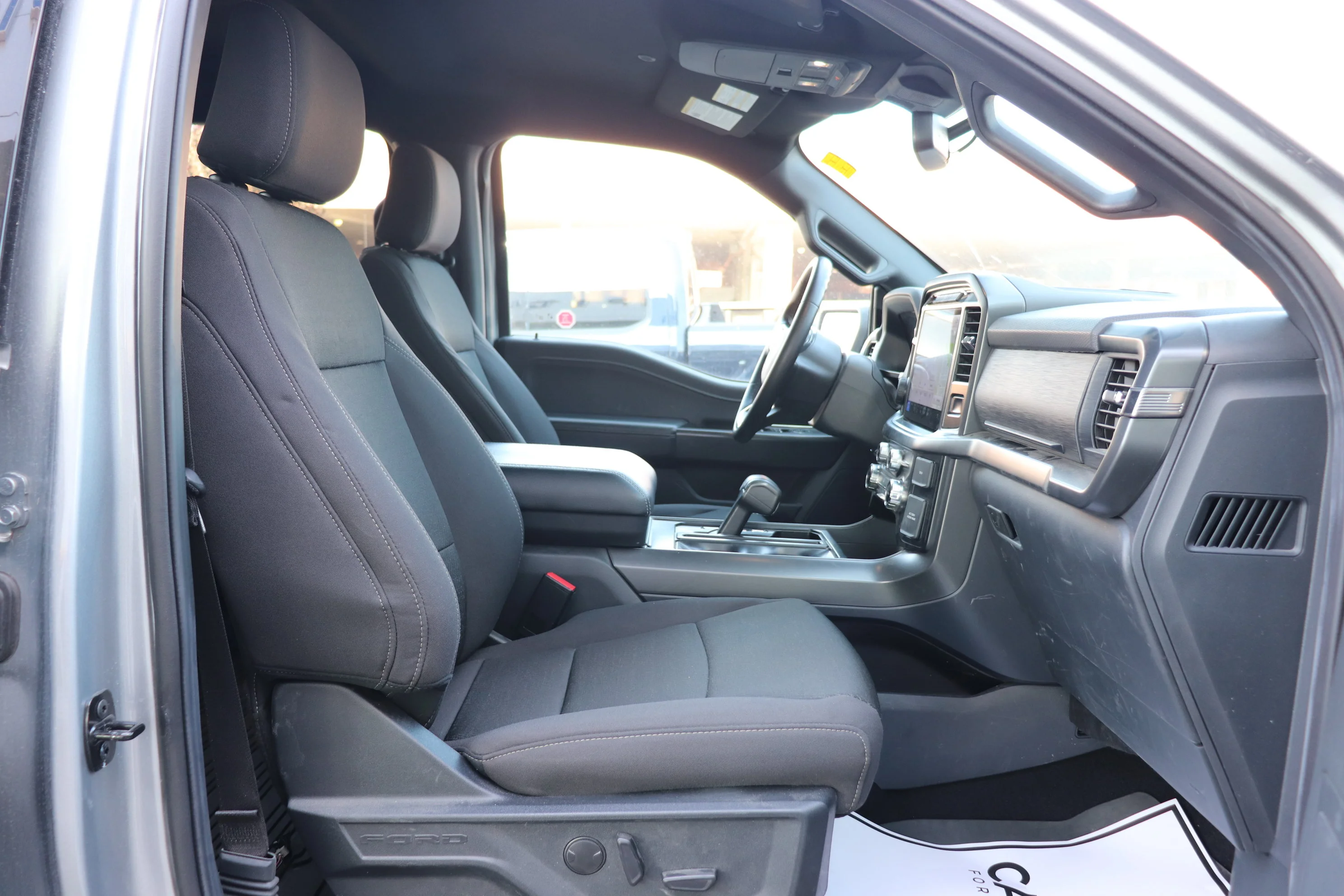 Used 2024 Silver Ford XLT 4WD SuperCrew 5.5