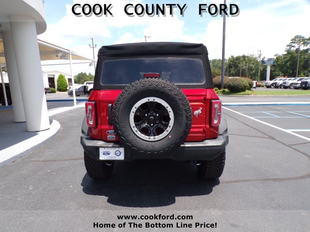 Used 2023 Hot Pepper Red Metallic Tinted Clearcoat Ford Badlands image 10