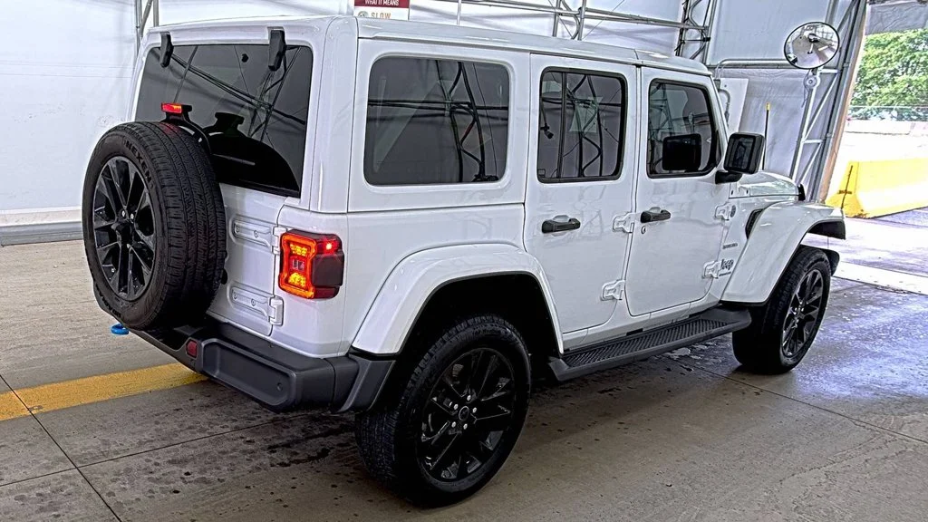 Used 2024 White Jeep Sahara 4xe image 2