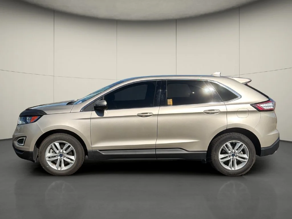 Used 2017 Gold Ford SEL image 4