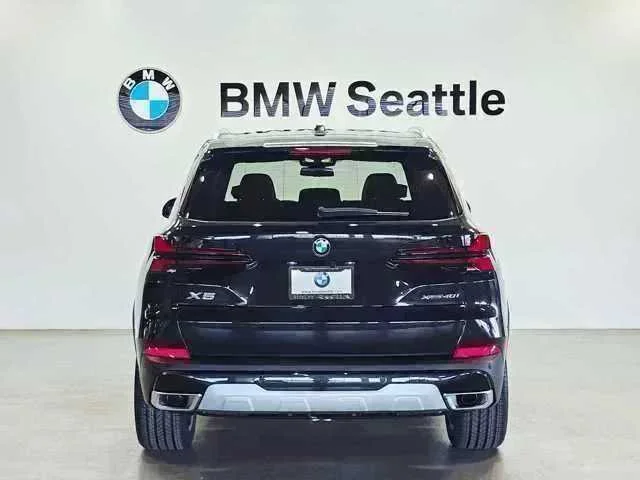 Certified Used 2026 Black Sapphire Metallic BMW xDrive40i image 5