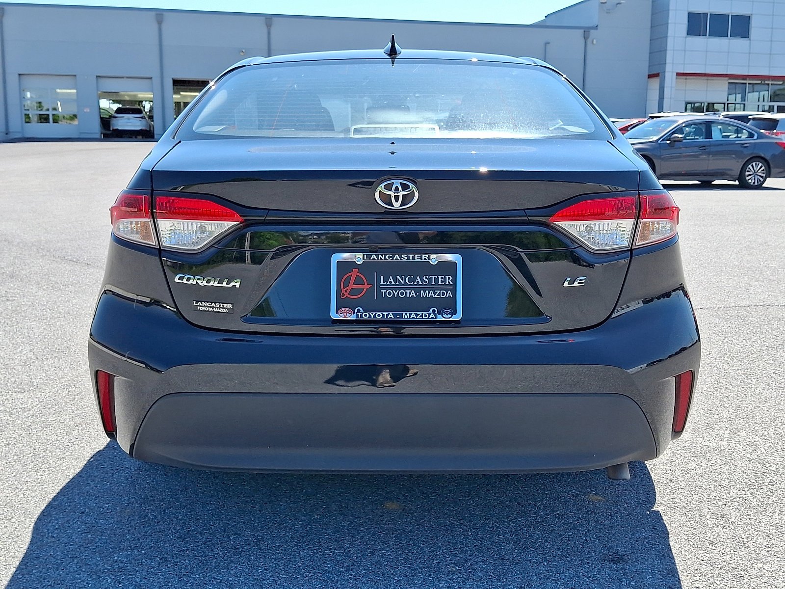 Used 2025 Midnight Black Metallic Toyota LE image 6