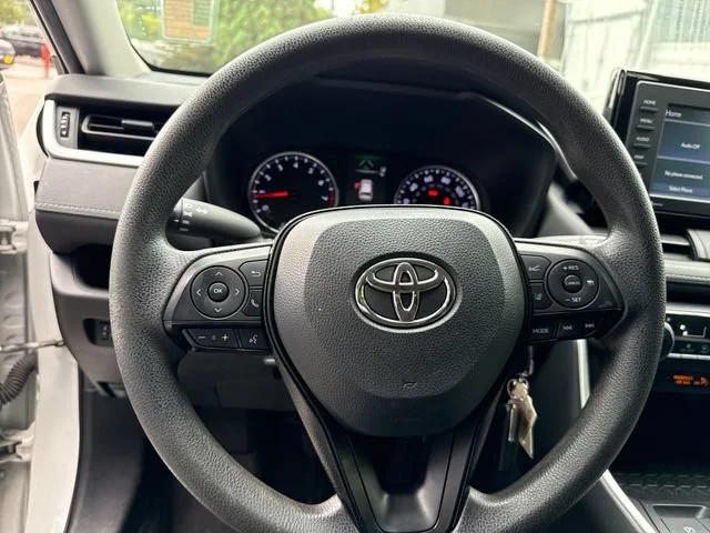 Used 2021 Super White Toyota LE image 18