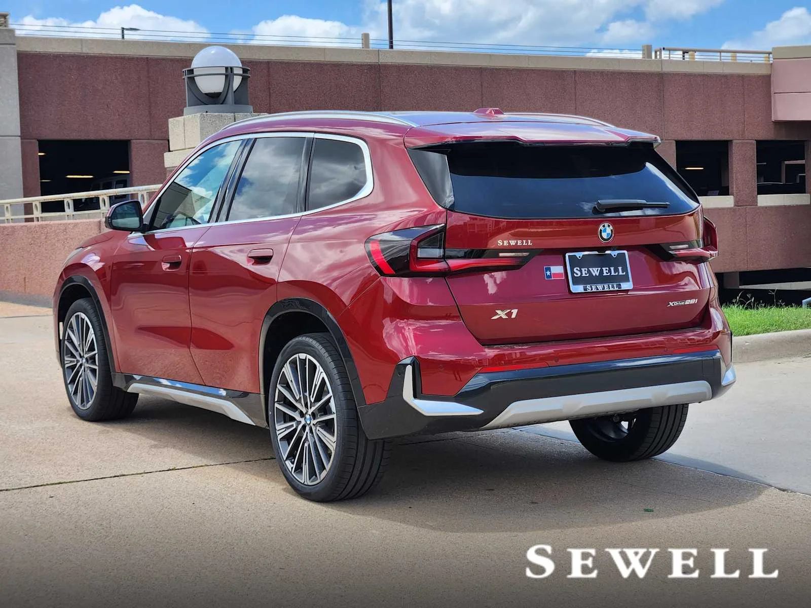 New 2026 Vegas Red Metallic BMW xDrive28i image 3