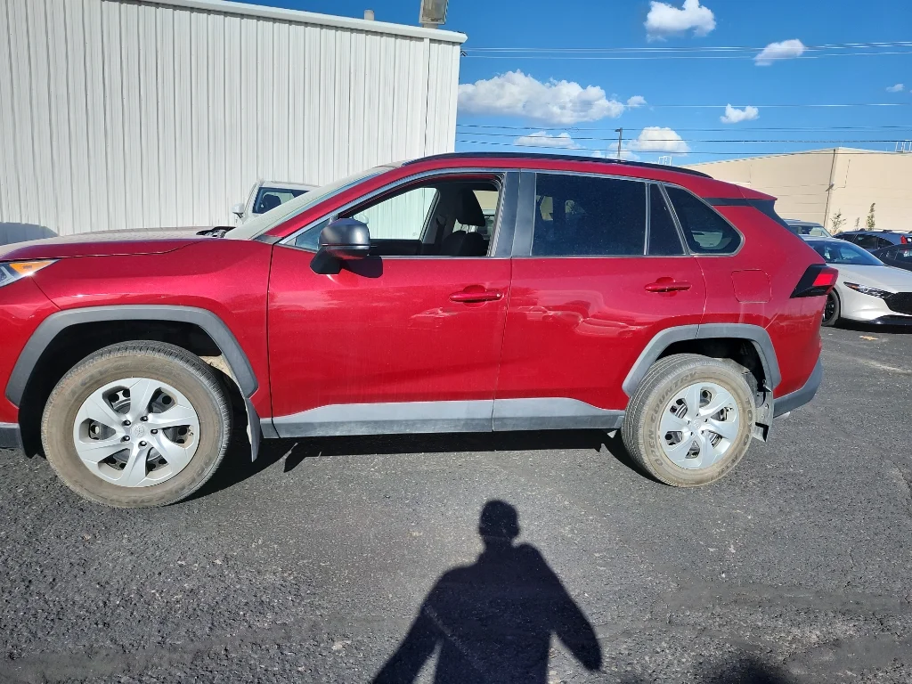 Used 2019 Ruby Flare Pearl Toyota LE image 1