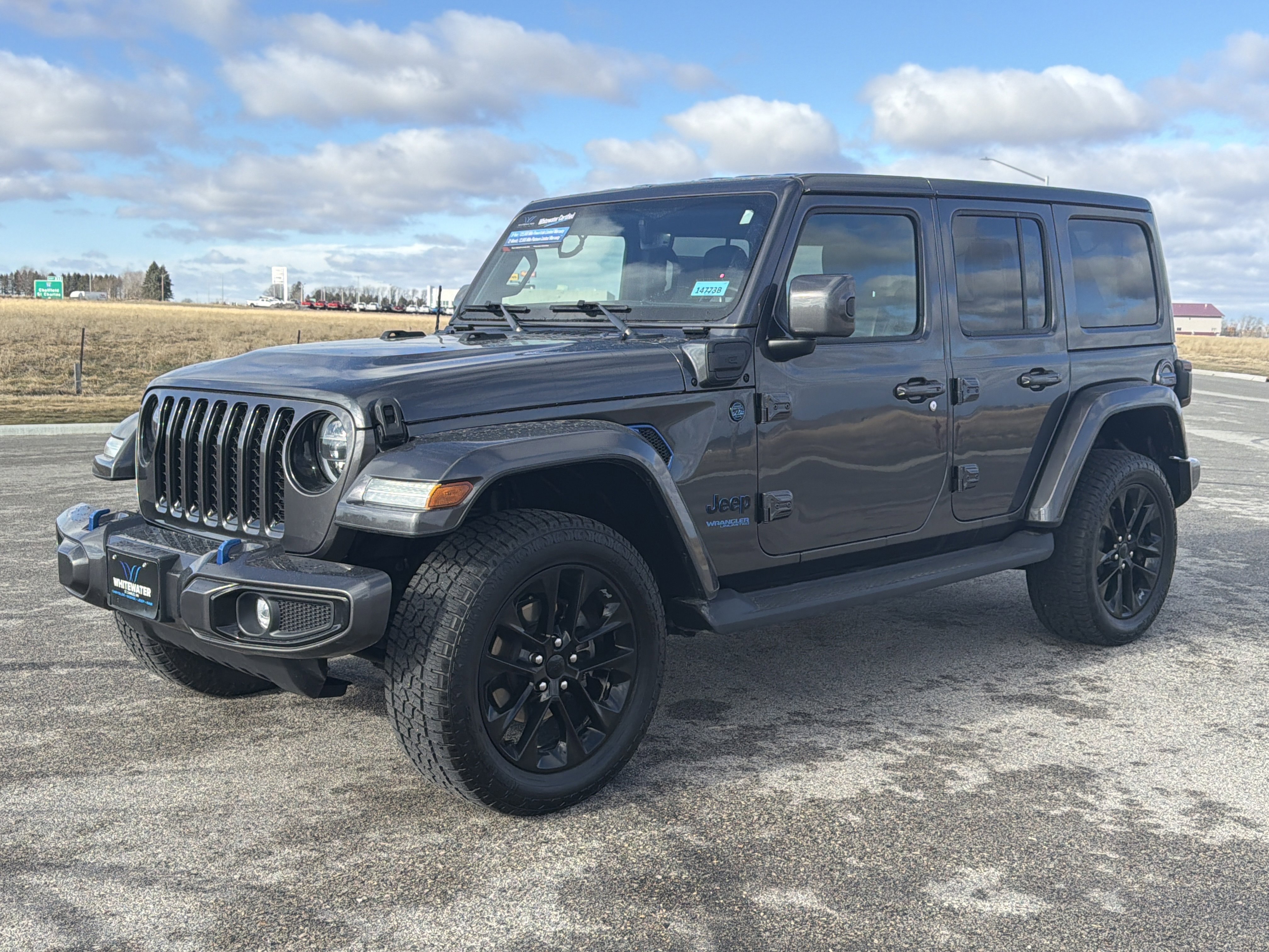 Used 2021 Jeep Wrangler Unlimited High Altitude 4XE with VIN 1C4JJXP6XMW675281 for sale in Saint Charles, Minnesota