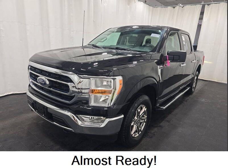 Used 2023 Agate Black Metallic Ford XLT image 1