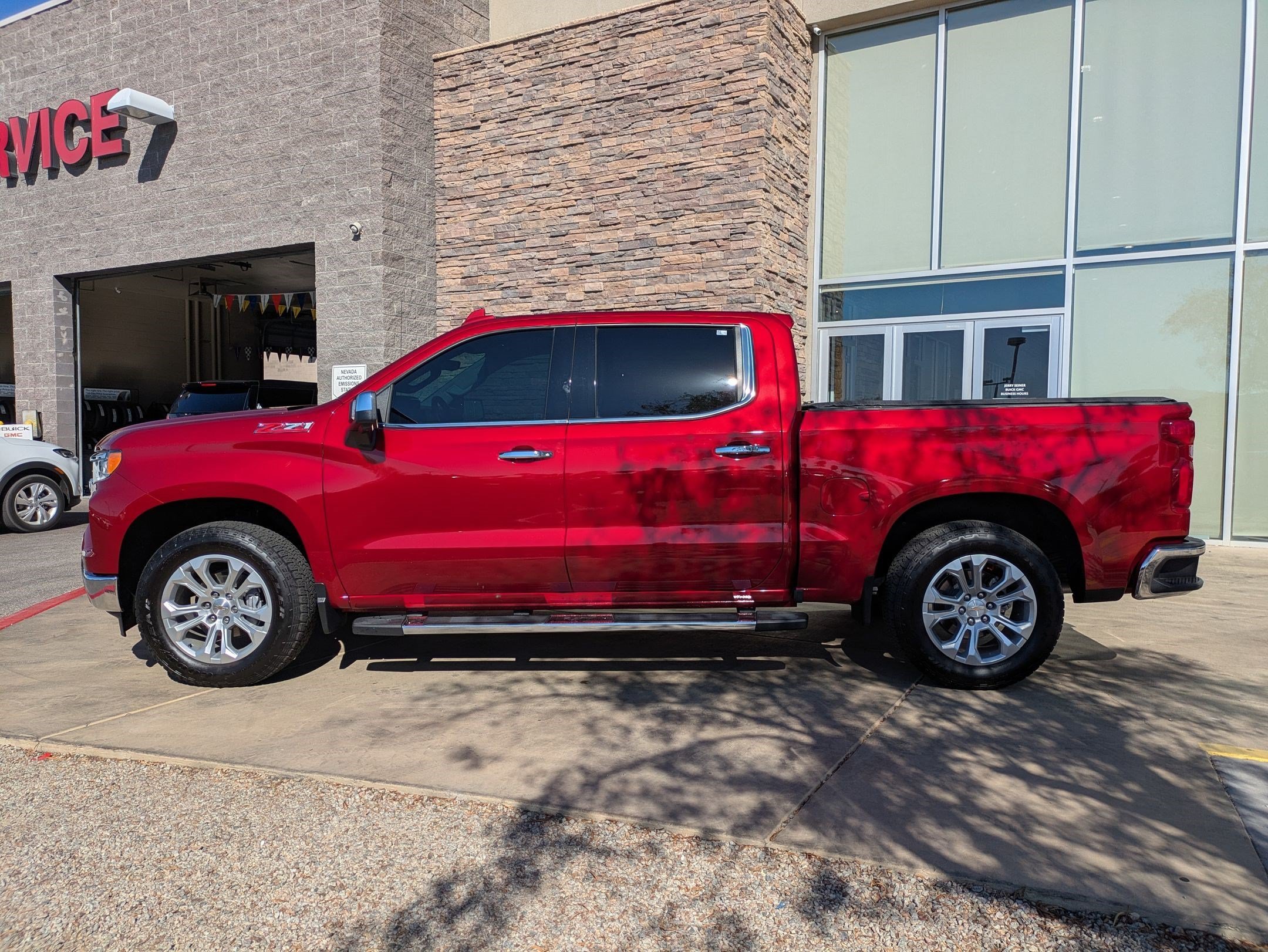 Certified Used 2025 Radiant Red Tintcoat Chevrolet LTZ image 2