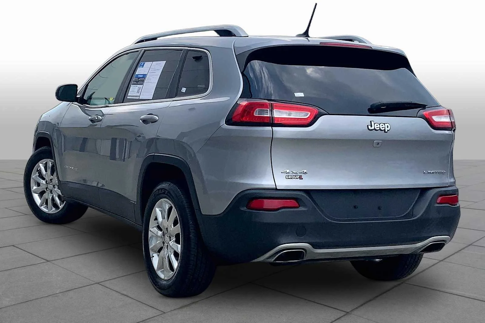 Used 2015 Billet Silver Metallic Clearcoat Jeep Limited image 12
