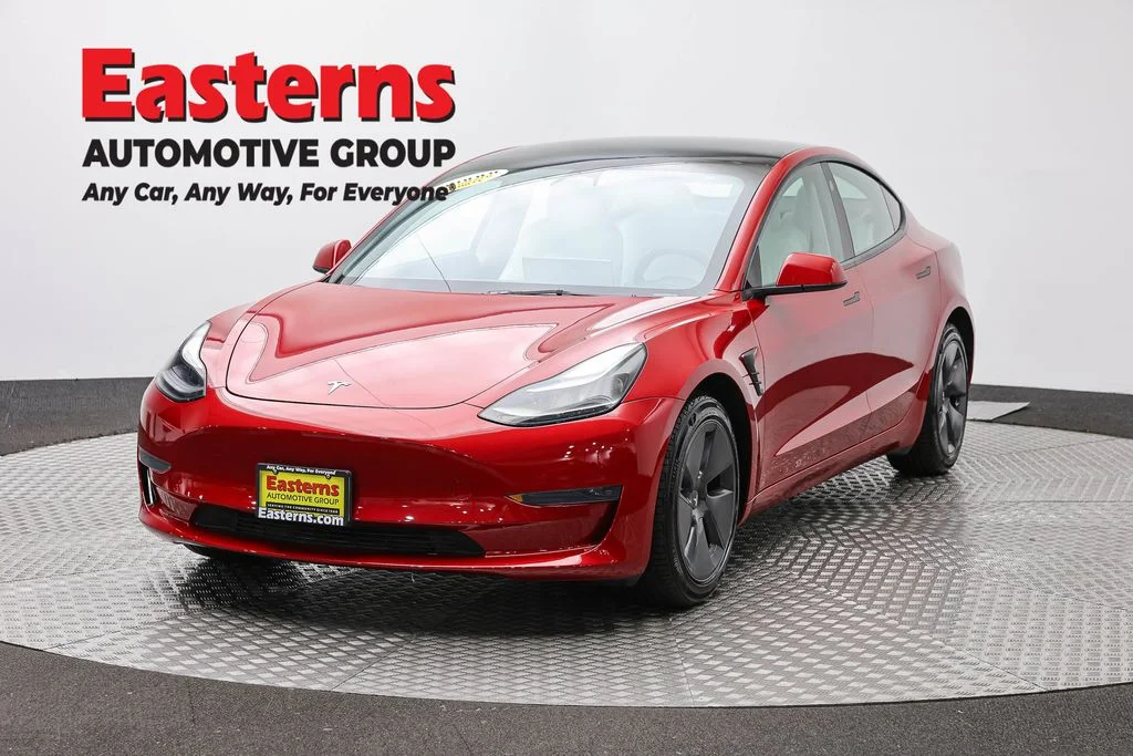 Used 2023 Red Tesla Base image 1