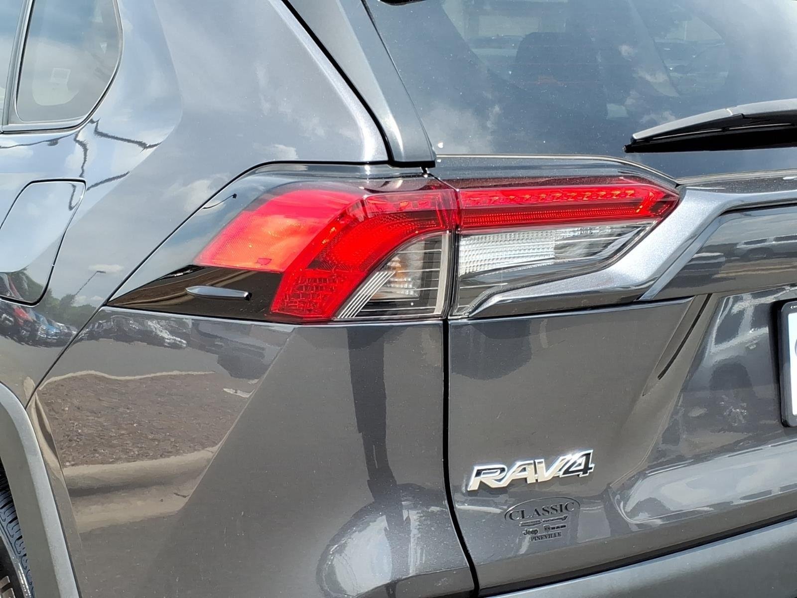 Used 2024 Magnetic Gray Metallic Toyota LE image 14