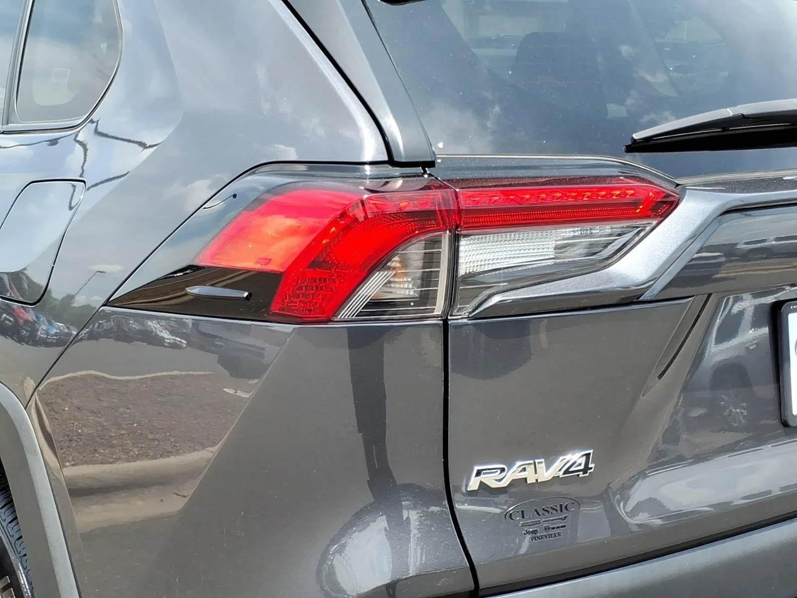 Used 2024 Magnetic Gray Metallic Toyota LE image 14