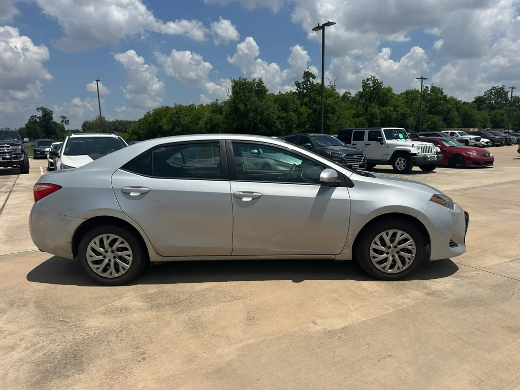 Used 2019 Classic Silver Metallic Toyota LE image 3
