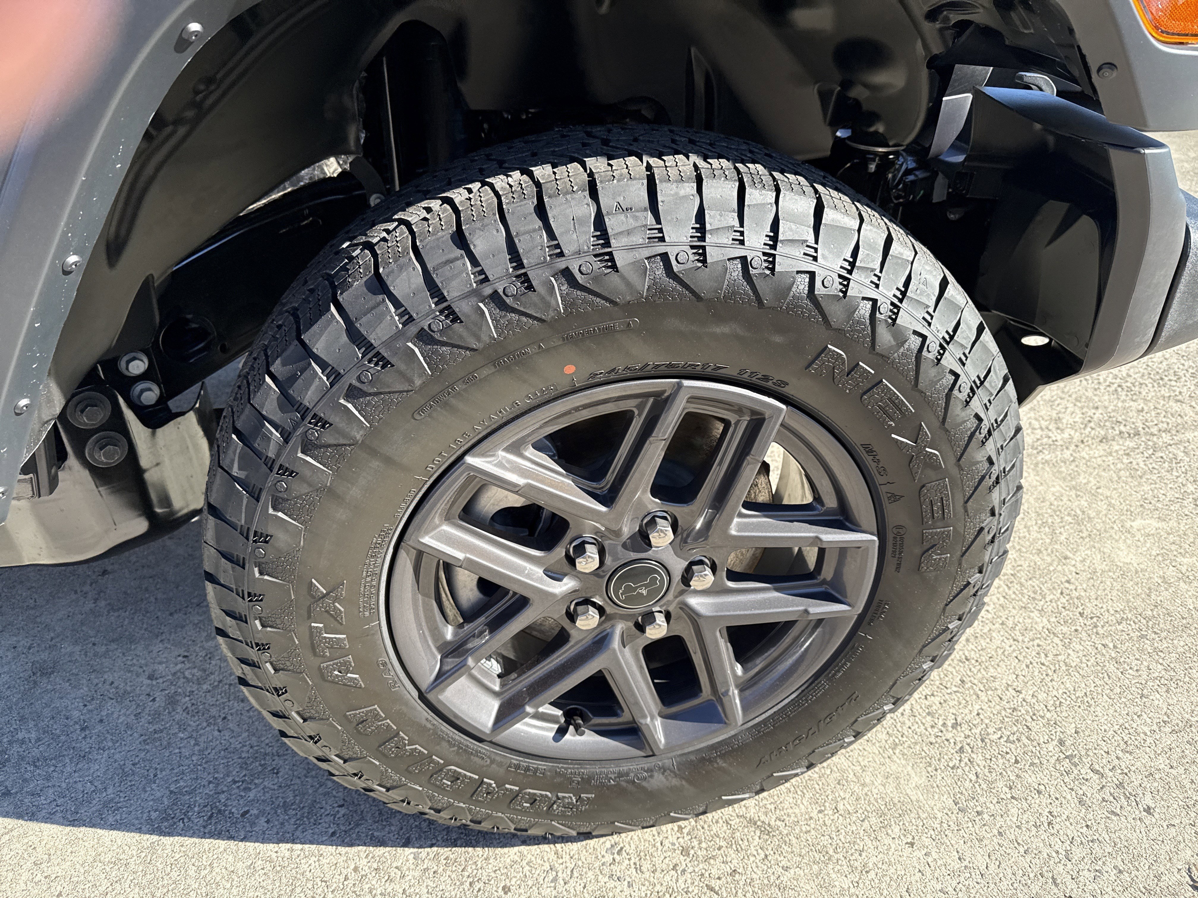 New 2026 Granite Crystal Metallic Clear-Coat Exterior Paint Jeep Sport S image 14