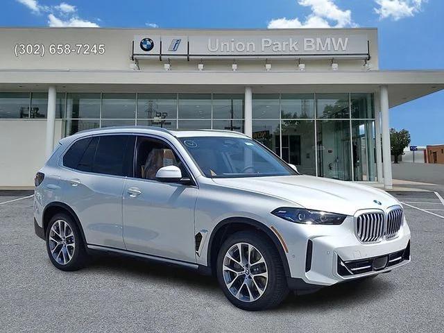 New 2026 Mineral White Metallic BMW xDrive50e image 3