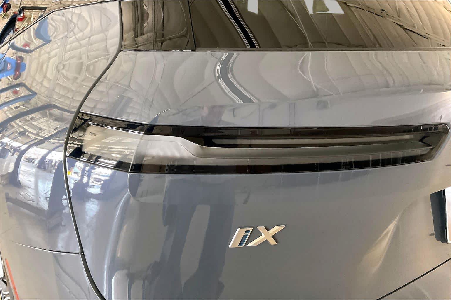 Used 2024 Storm Bay Metallic BMW xDrive50 image 25