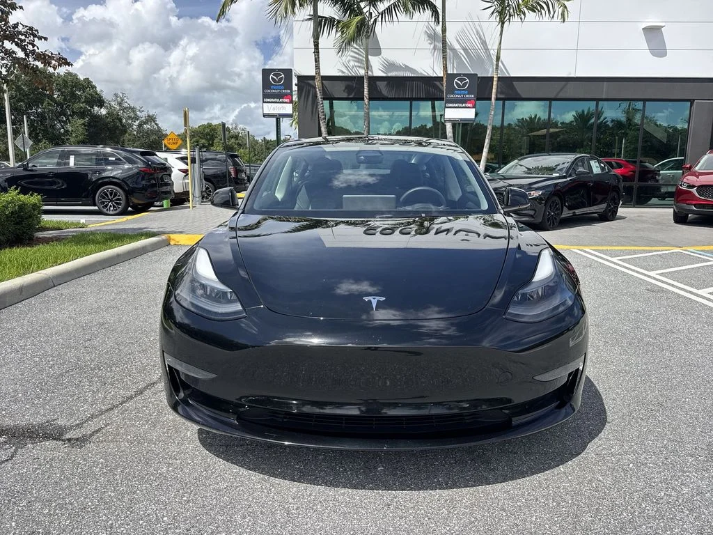 Used 2023 Solid Black Tesla  image 29