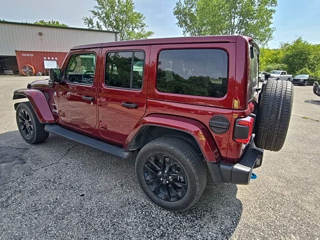 Used 2022 Red Jeep Unlimited Sahara 4xe image 4