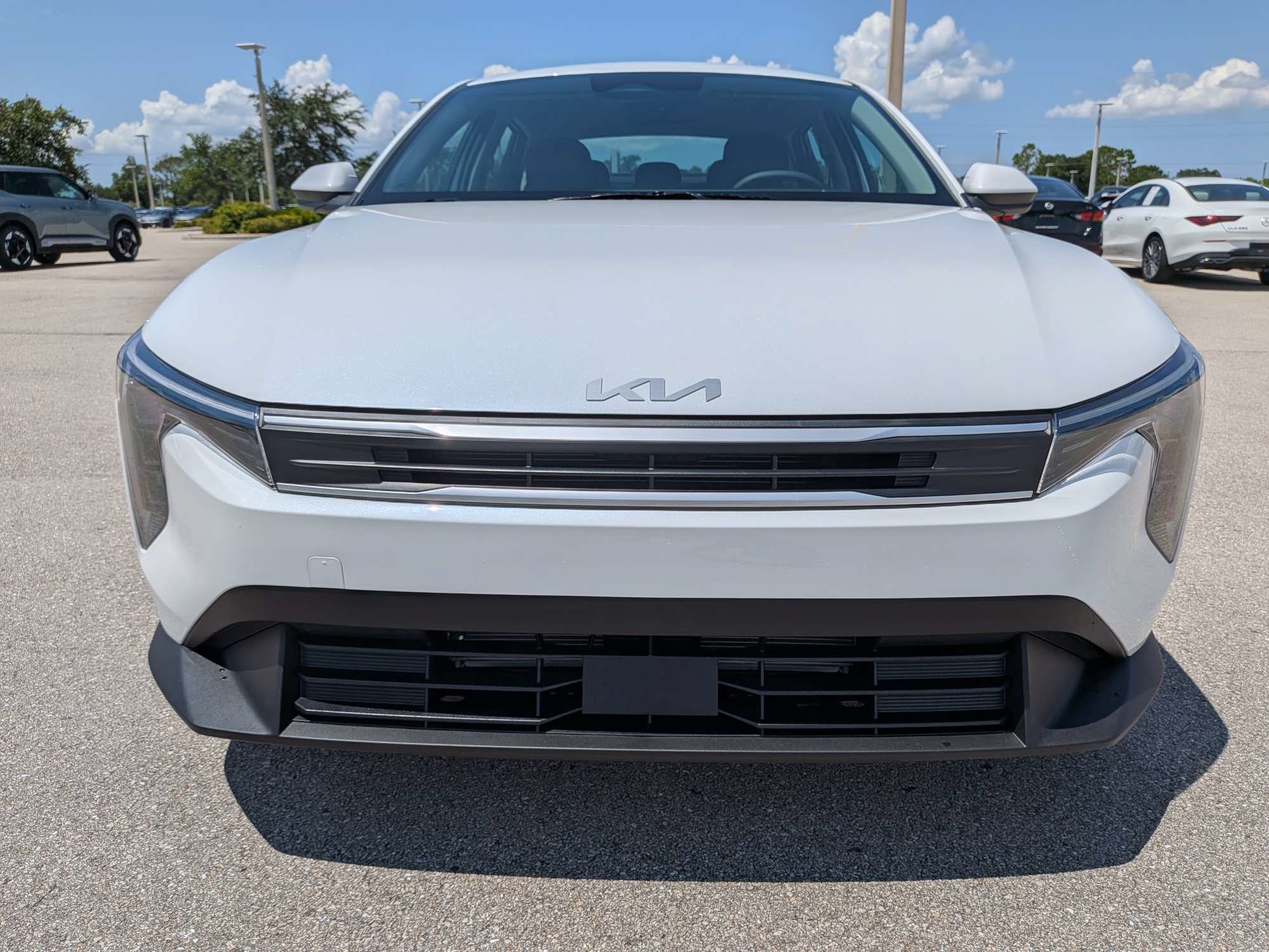 New 2026 Snow White Pearl Kia LX image 3