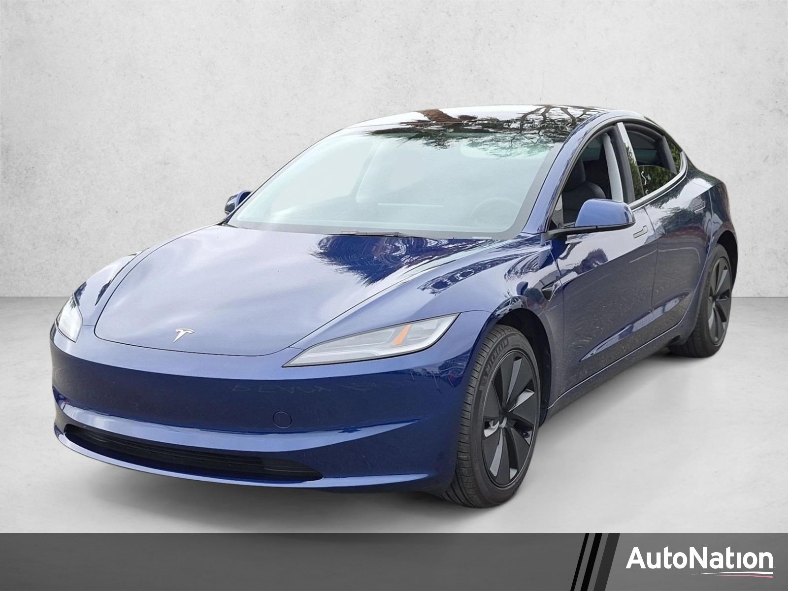 Used 2024 Deep Blue Metallic Tesla  image 1