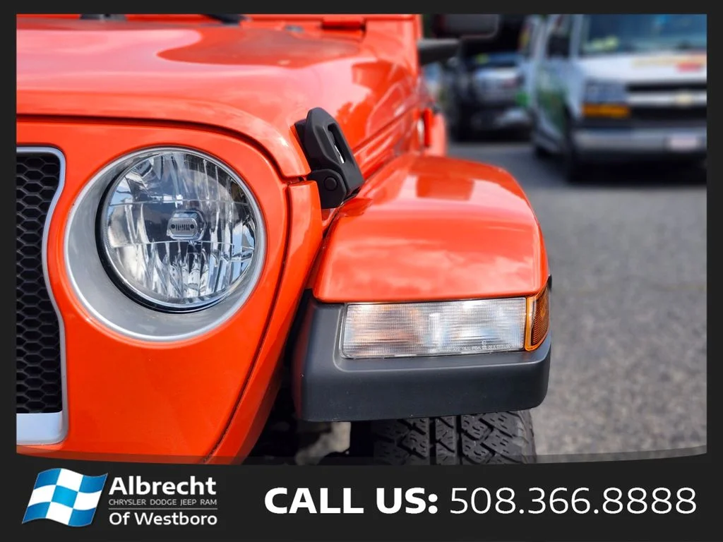 Used 2020 Orange Jeep Unlimited Sahara image 10
